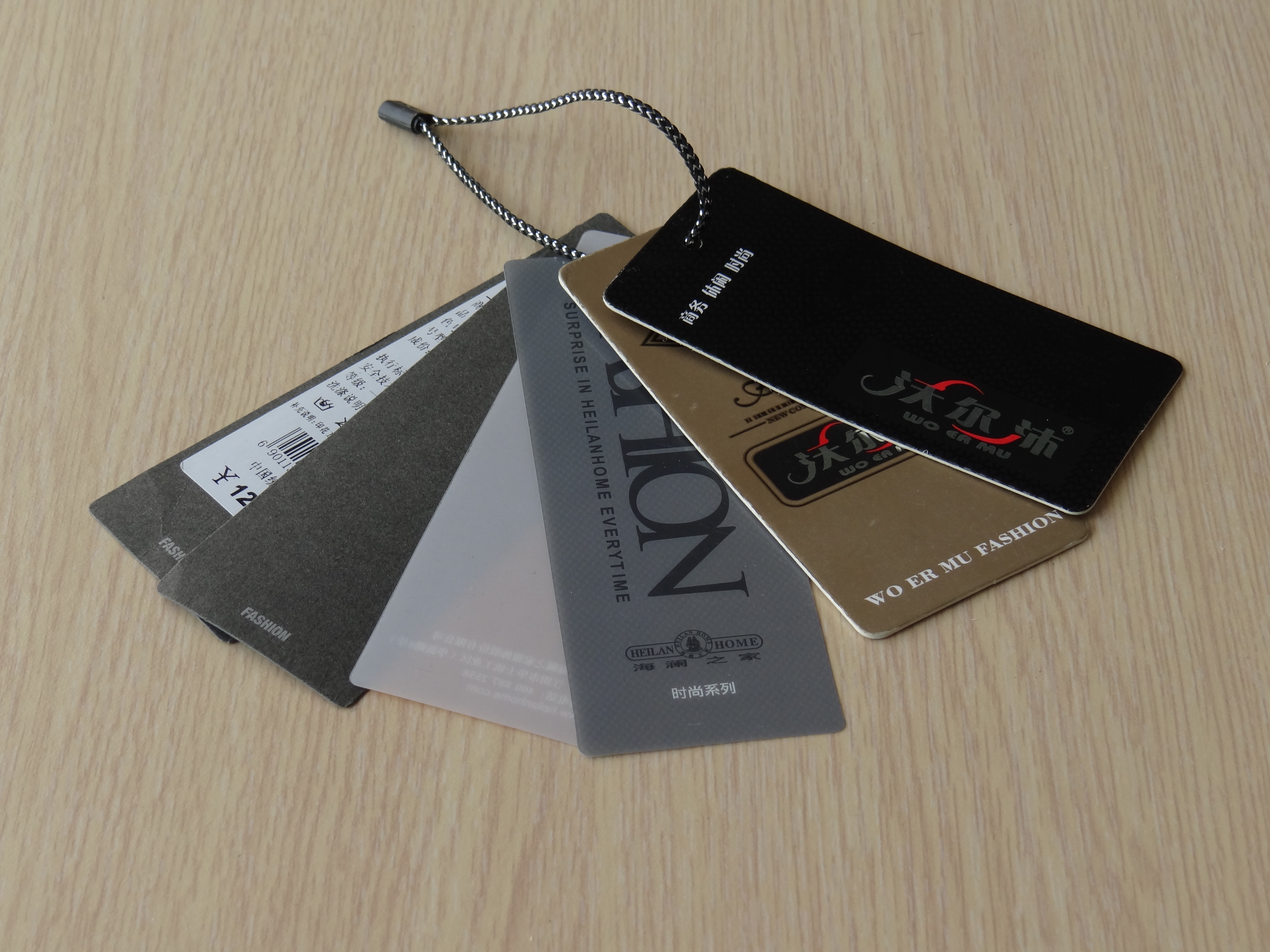 服裝吊牌定做-廣州駿業包裝實業有限公司 服裝吊牌定做